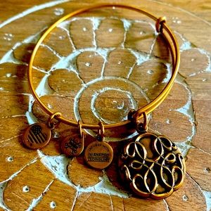 Gold charm bracelet .